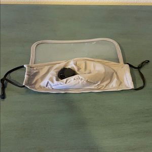 Face mask with eye shield